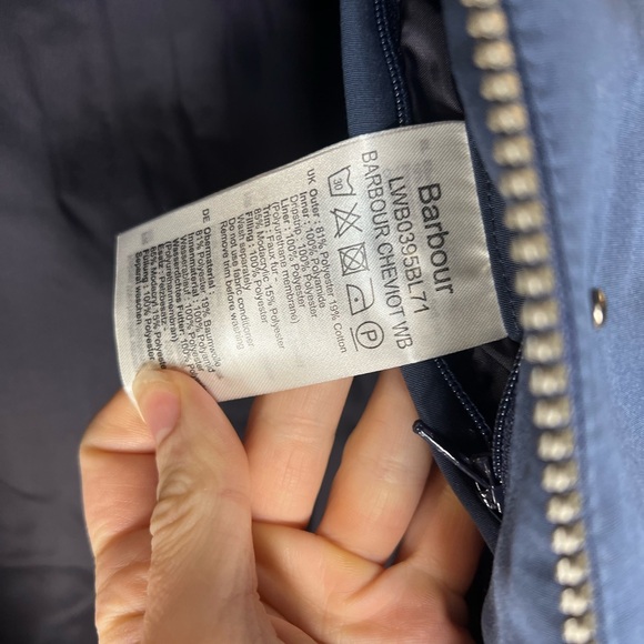 Barbour Cavaviot WB parka jacket with a fur hood in a navy color. - Picture 6 of 8